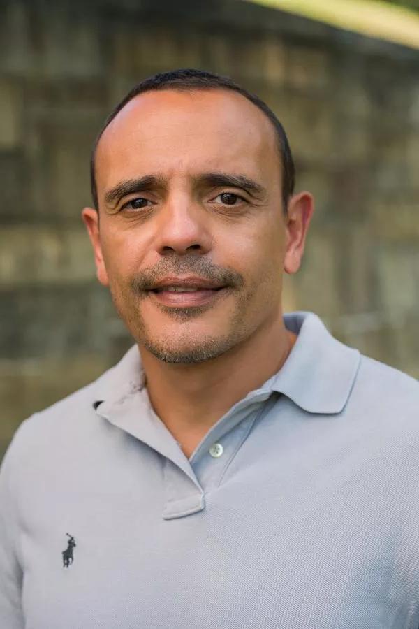 A headshot of UNH dairy researcher Andre Brito