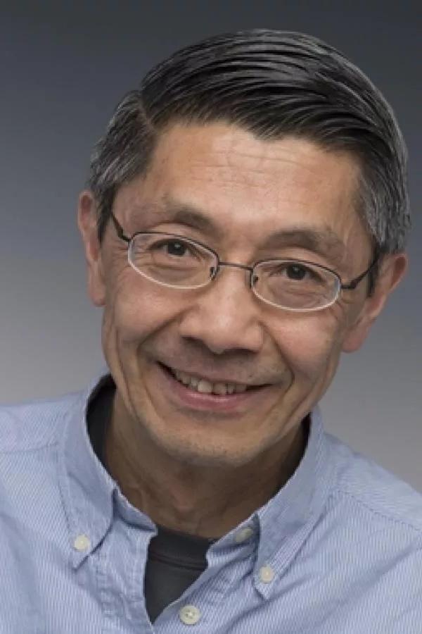 A headshot of UNH dairy researcher Paul Tsang